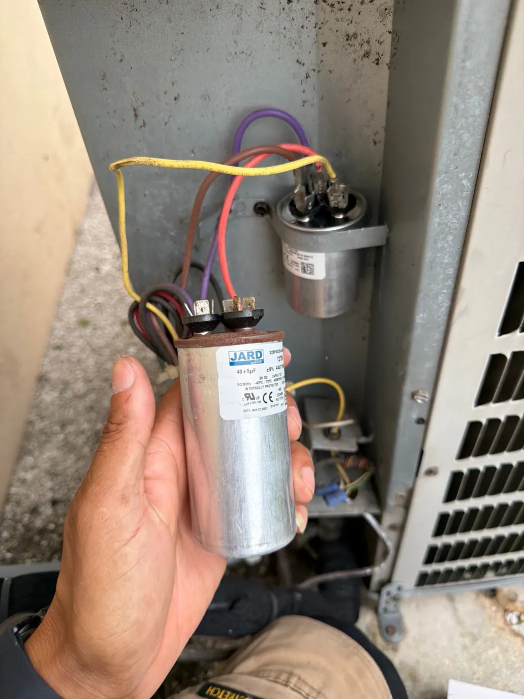AC capacitor replacement in progress